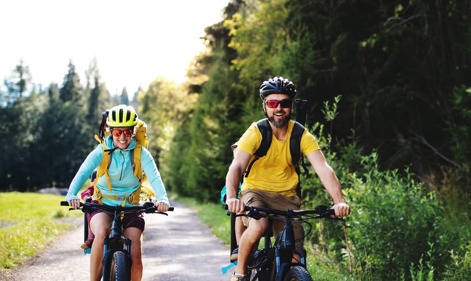 family-with-small-children-cycling-outdoors-in-sum-2024-10-18-08-29-57-utc